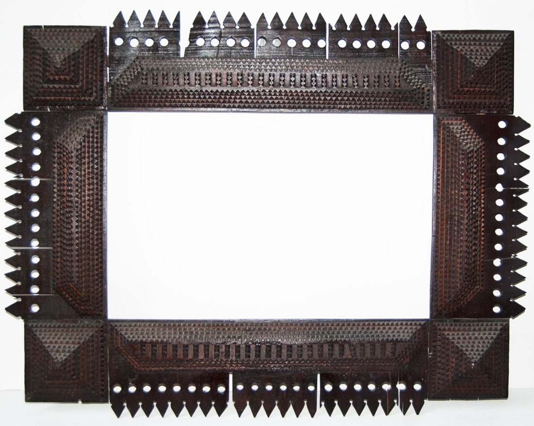 American 19th C. appiled carved wood Tramp Art frame: American 19th C. appiled carved wood Tramp Art frame Canvas that frame will accommodate: 14 x 21 1/2 Frame width: 6
