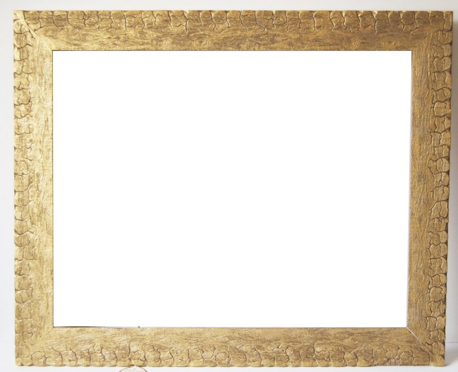 American 20th C. hand carved and gilded arts frame: American 20th C. hand carved and gilded arts frame with raw wood design.Canvas size frame can accommodate: 22 x 28 Frame width: 3
