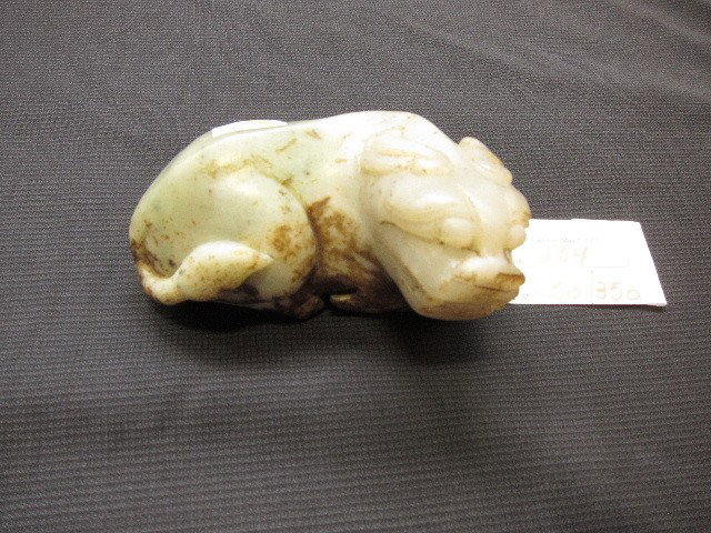 CARVED HAN DYNASTY BEAST: Green stone, couchant animal. Length 4.25"