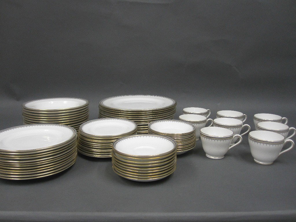PARTIAL SPODE"WARWICK" CHINA SERVICE: Even service for 12 including dinner, salad, soup, and bread plates, fruit bowls, and cups and saucers.