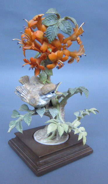 ROYAL WORCESTER D. DOUGHTY PHOEBE CHICK: With Flame Vine. H. 10." Artist signed. With box.