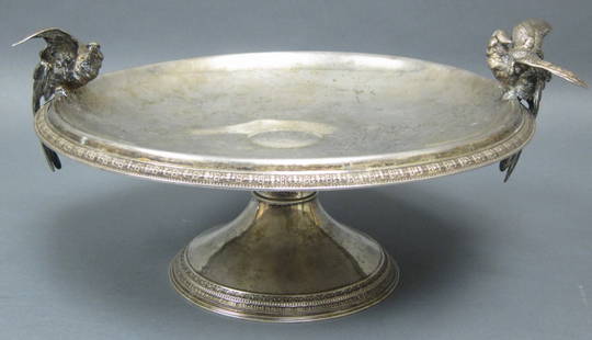 TIFFANY & CO. STERLING SILVER TAZZA: Marked 3657, 734 M on the base. The bowl rim and foot with decorative bands. With a center monogrammed medallion and two figural cockatoo on the rim. Diam. 12.25, H. 6.5." Approx. 37.5 Troy ozs.