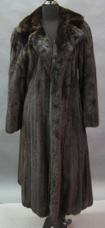 FULL LENGTH DARK BROWN MINK COAT: With notch collar and pockets on the seams.