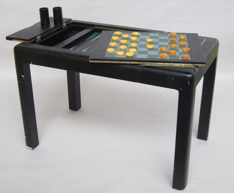 KARL SPRINGER: A vintage modern faux block ostrich lacquered games table having a green and gray checkerboard top that lifts by hidden lever to reveal a leather backgammon board interior. Bears original Karl Springe