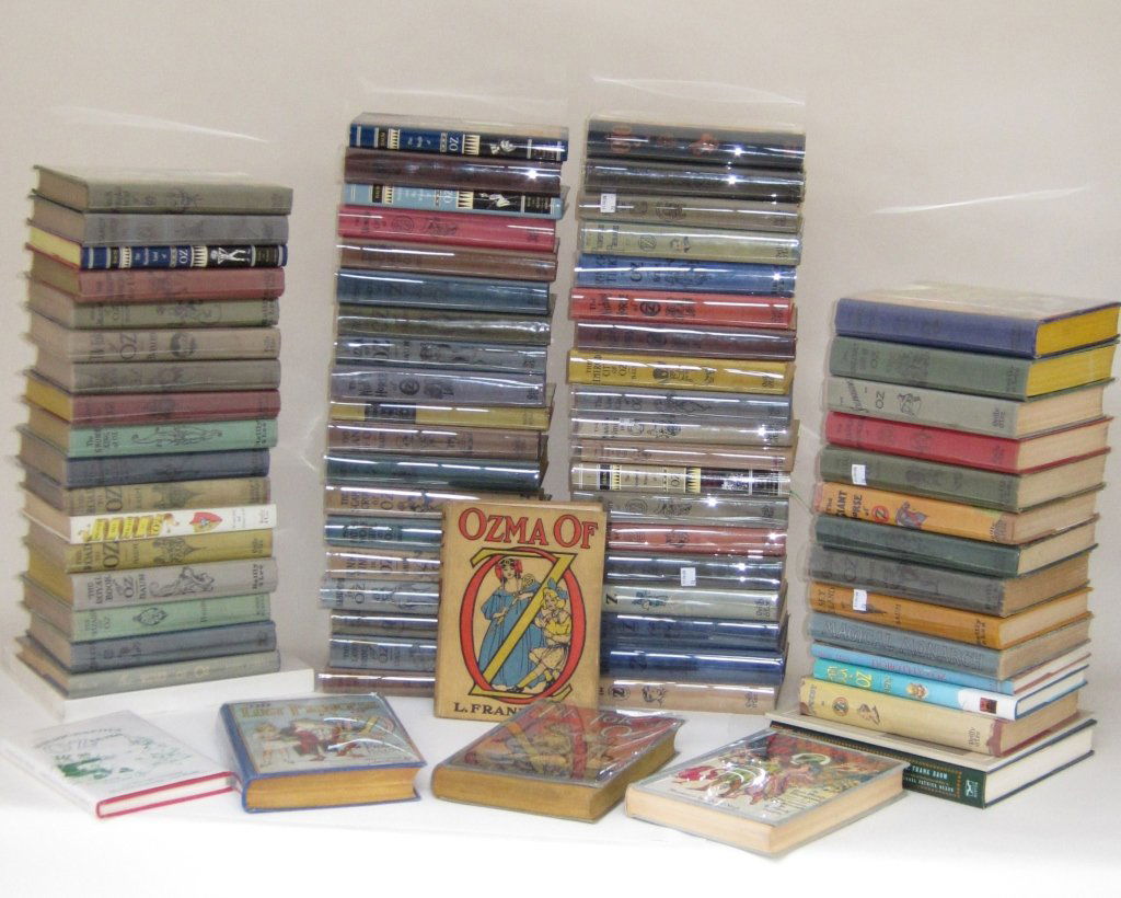LARGE COLLECTION OF OZ BOOKS: 76 volumes by L. Frank Baum and others of various dates. Along with Bibliographia Oziana and other reference books. Provenance: From a Greene Street, New York Estate.