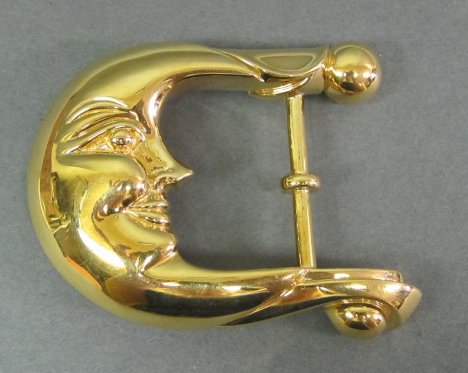 BARRY KIESELSTEIN CORD STERLING VERMEIL BUCKLE: Large scale modern design with "man in the moon" motif. H. 2 1/2, L. 3 1/8." 2.4 Troy ozs.