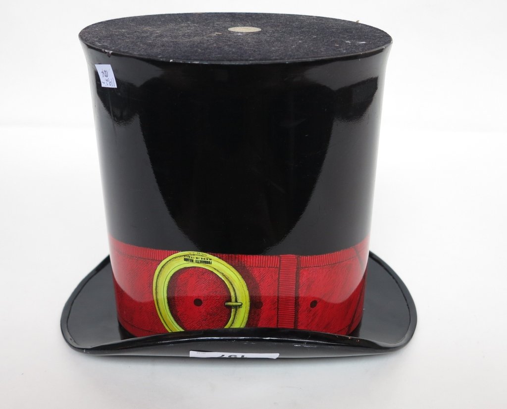 FORNASETTI TOP HAT FORM BIN: Labeled on the buckle No. 5/93. L.C. Gilt paper label on the base. H. 10."