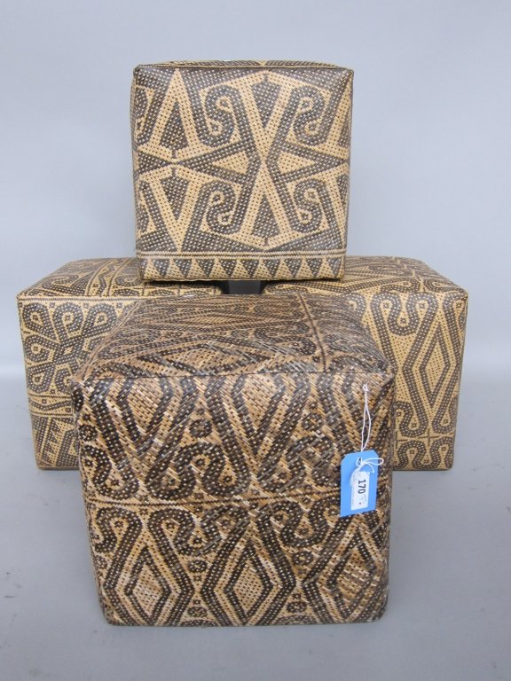 CUBE SEATS: A group of four contemporary woven rattan cube form seat/ ottoman each in a different tribal geometric design (18" x 18" x 18" each ) Provenance: A group of fine property from a Larchmont New York col