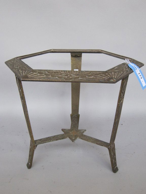 ART DECO TABLE: a 2nd quarter 20th century. art deco bronze cast low hexagonal stand. the triangular stretcher having a center star medallion, lacking insert top 22.5"X 18.5 "