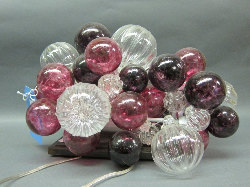 LIGHT FIXTURE: A Mid-20th Century luminescent Art Glass table lamp comprised of clusters of spherical colorless and amethyst glass globes of various sizes. Measures: 17" L x13: W x 9½"H