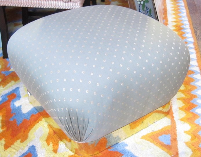 KARL, SPRINGER: A pair 20th century modern Pouffes designed by Karl Springer, NYC. The green upholstered pillow seats, brass banded at the base, raised on hidden caster feet with steel brackets. 25" L x 25" W x 17.5"