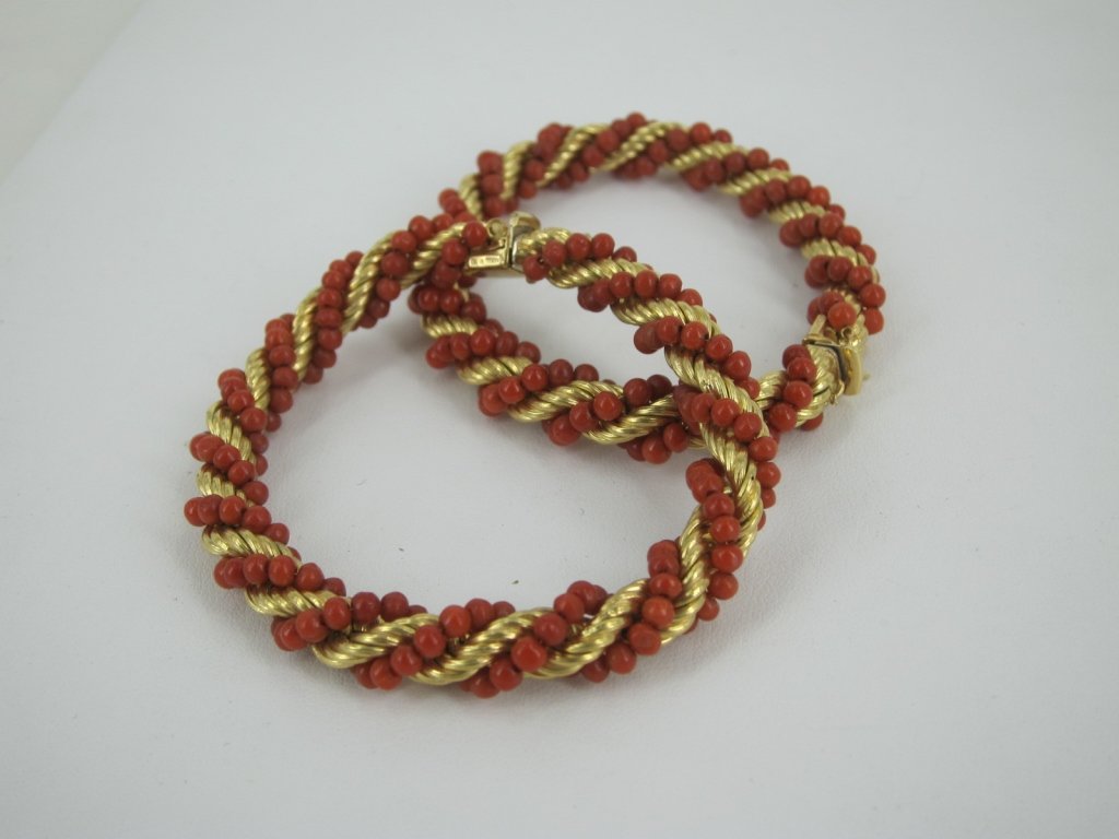 PAIR OF BRACELETS: A pair of 14k yellow gold and red coral bead break apart bracelets. May be combined into a choker necklace. Measures: 15" combined. Provenance: Property from East 64th St, Manhattan, N.Y. home. Pre-Sa
