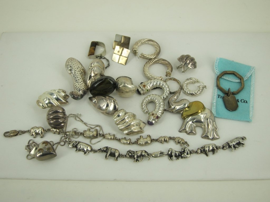 GROUP OF MISCELLANEOUS SILVER: Including Tiffany & Co. key ring. Weight: 5.80 Troy ozs. total. Provenance: Property from East 64th St, Manhattan, N.Y. home. Pre-Sale Estimate: $300/500