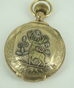 ELGIN HUNTER CASE POCKET WATCH: A third quarter 19th Century 14k yellow gold cased Elgin 17 jewel stem wind pocket watch. The front cover decorated with stag and foliate design, the back cover with shield and foliate design. The cas