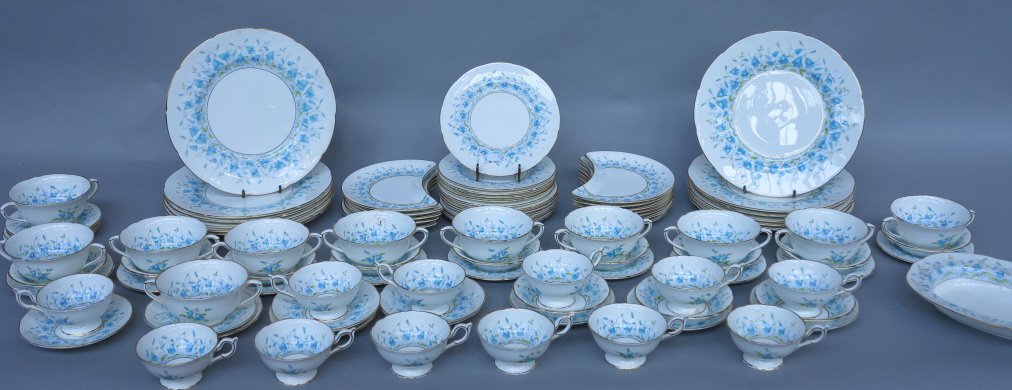 COALPORT "HAREBELL" DINNER SERVICE: Including 12 each dinner, salad and bread & butter plates, 12 curved plates, 12 fruit bowls, 12 cups, 12 cream soups, 11 saucers total, and a vegetable bowl. Diam. dinner plate 10 3/4."