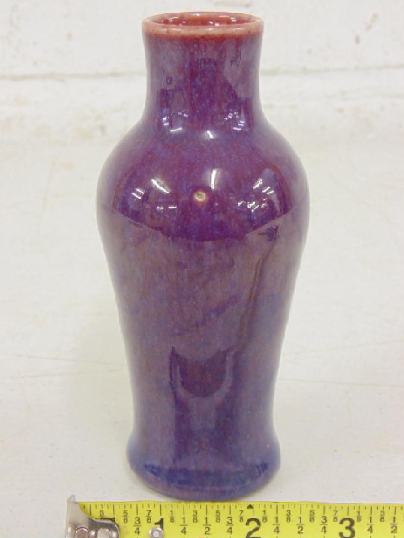Chinese purple hue glazed Sang de boeuf vas: Chinese flambe Oxblood purple hue glazed Sang de boeuf vase, height is 5 6/8", in good condition. . Please refer to images for general condition issues, all items sold in "as is" condition, all sales 