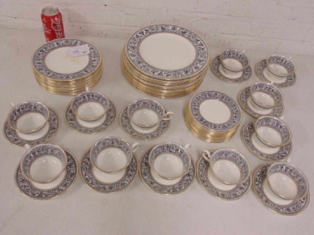 Set of porcelain dinnerware by Wedgwood, "Florentine",: Set of porcelain bone china dinnerware by Wedgwood, "Florentine", dinner plates, dessert or salad plates, cups & saucers & cake plates, service for 12. . Please refer to images for general condition i