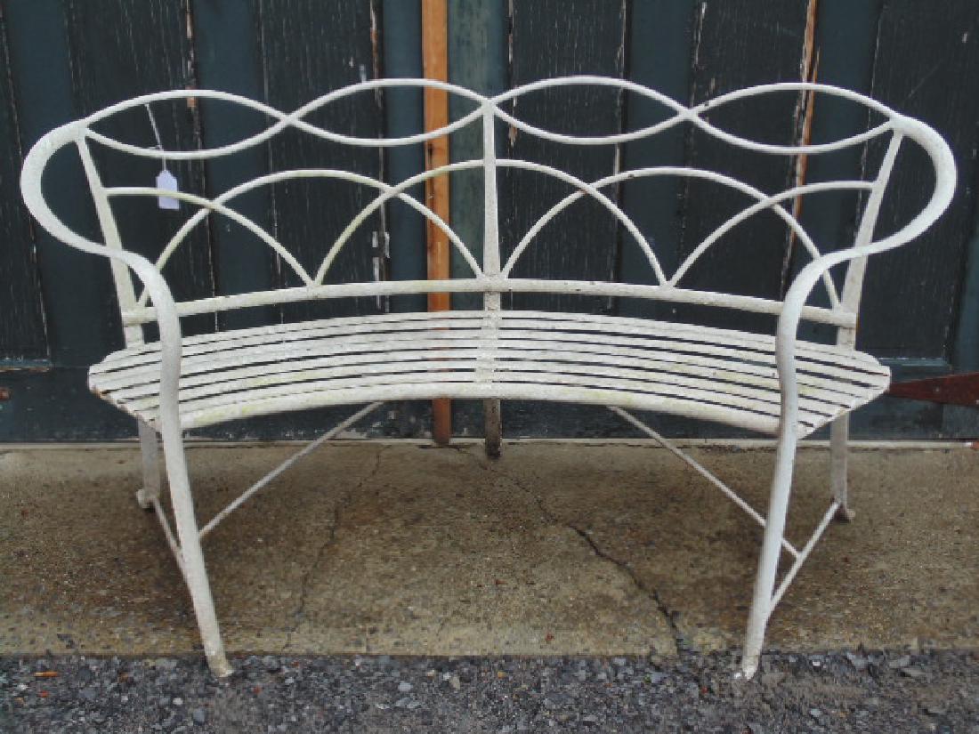 Curved iron bench with slatted seat (1 of 5)