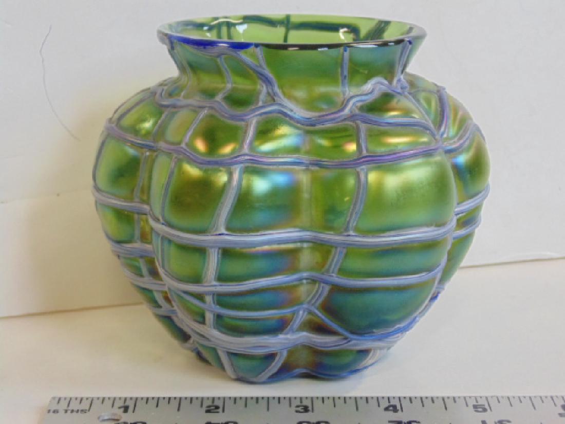 Green glass Loetz type Czech or Austrian bowl: Green art glass Loetz type Czech or Austrian bowl with decorative applied line pattern, height is 4.25", diameter is 4.75", in good condition