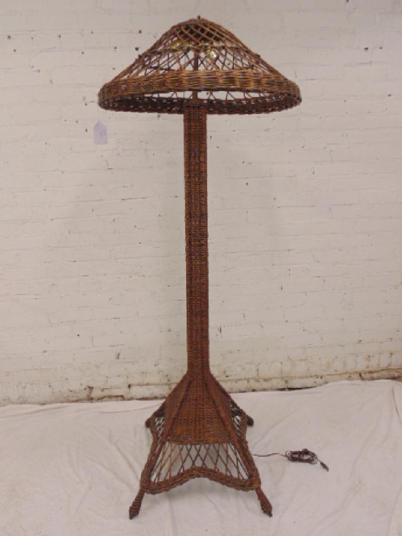 Wicker floor lamp with wicker shade: Wicker floor lamp with wicker shade, linen lining from shade is missing, height is 70", minor breaks. Please refer to images for additional information, all items are sold as is, as found, all sales a