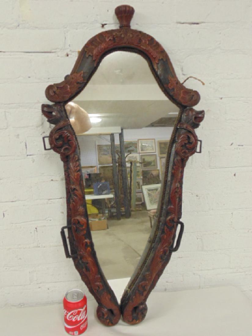 Antique carved shield shaped mirror with carved dogs (1 of 7)