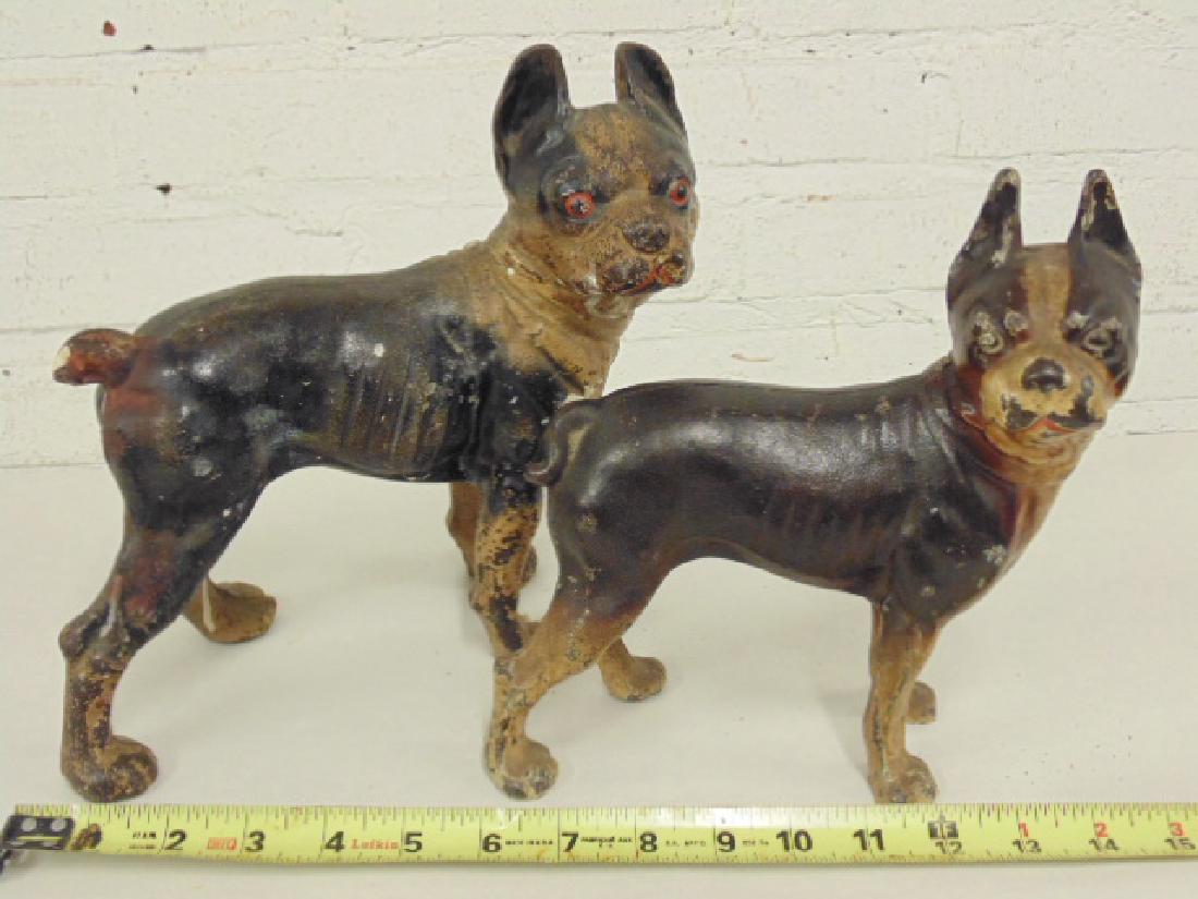 2 cast iron bulldog doorstops, old paint: 2 Cast Iron Boston Terrier Bulldog Doorstops, old paint; 8.5" and 9.25". Please refer to images for additional information regarding condition issues, please remember all items are sold in as found, a