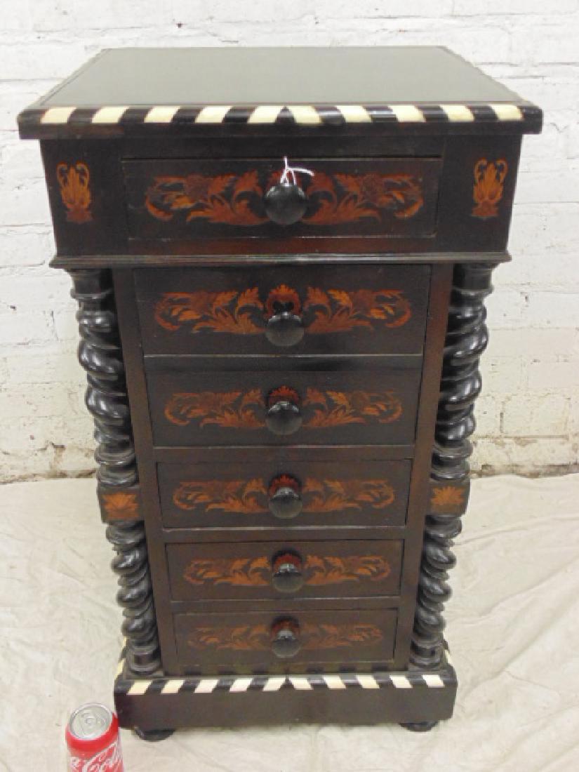 Ebony & bone inlaid chest, ebony spiral columns: Antique Ebononized Wood Chest, with bone inlay design and ebony spiral columns. The chest features 4 drawers and a drop front cabinet space with marquetry decoration at front. Top is 16" x 17.5", heig