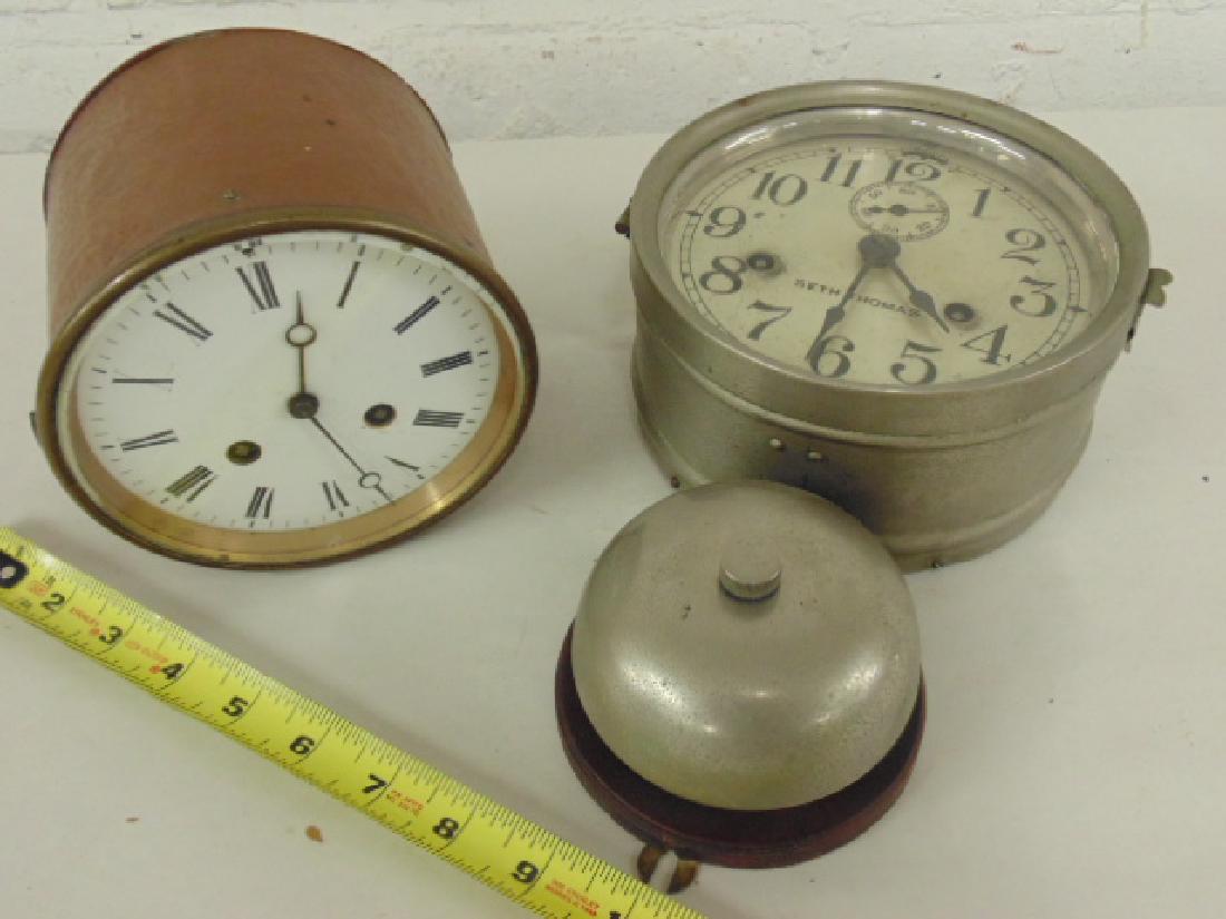 2 clocks, copper & Seth Thomas wall clock: 2 clocks, copper cased clock & Seth Thomas wall clock, copper clock has no make and is 5.25" in diameter, Seth Thomas clock is 10.5" long, including exterior ball. Please refer to images for additiona