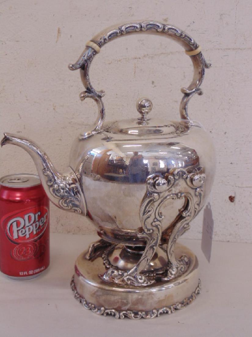Sterling silver teapot on stand, burner in base