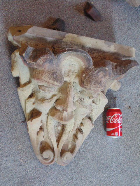 Carved limestone architectural building element, head, (1 of 4)