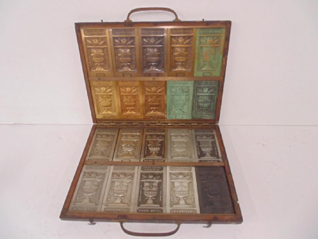 Bronze patina sampler case, circa 1900: Rare bronze patina sampler case, turn Century, wood case containing 20 different bronze plaques each with a different patina to show costumers various options for custom bronze work, by Superb Bronze
