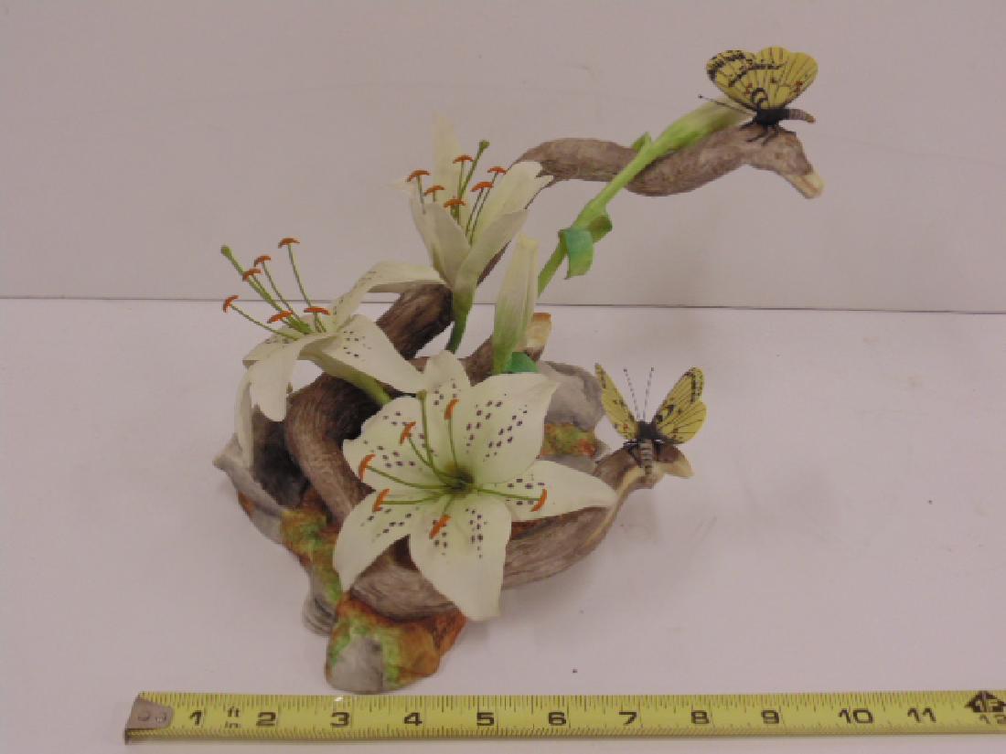 Boehm, England limited edition porcelain floral group: Boehm, England limited edition bone porcelain floral group, "lilies with butterfly", number 95, 1982, excellent condition. All items sold as is, all sales final, contact us if you need more informatio