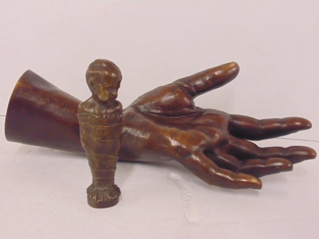 Bronze hand & small bronze "baby" seal, "Jane M. Hunt",: Bronze hand & small bronze "baby" seal, "Jane M. Hunt", Paris 1852, hand is 10" tall, baby is 4"