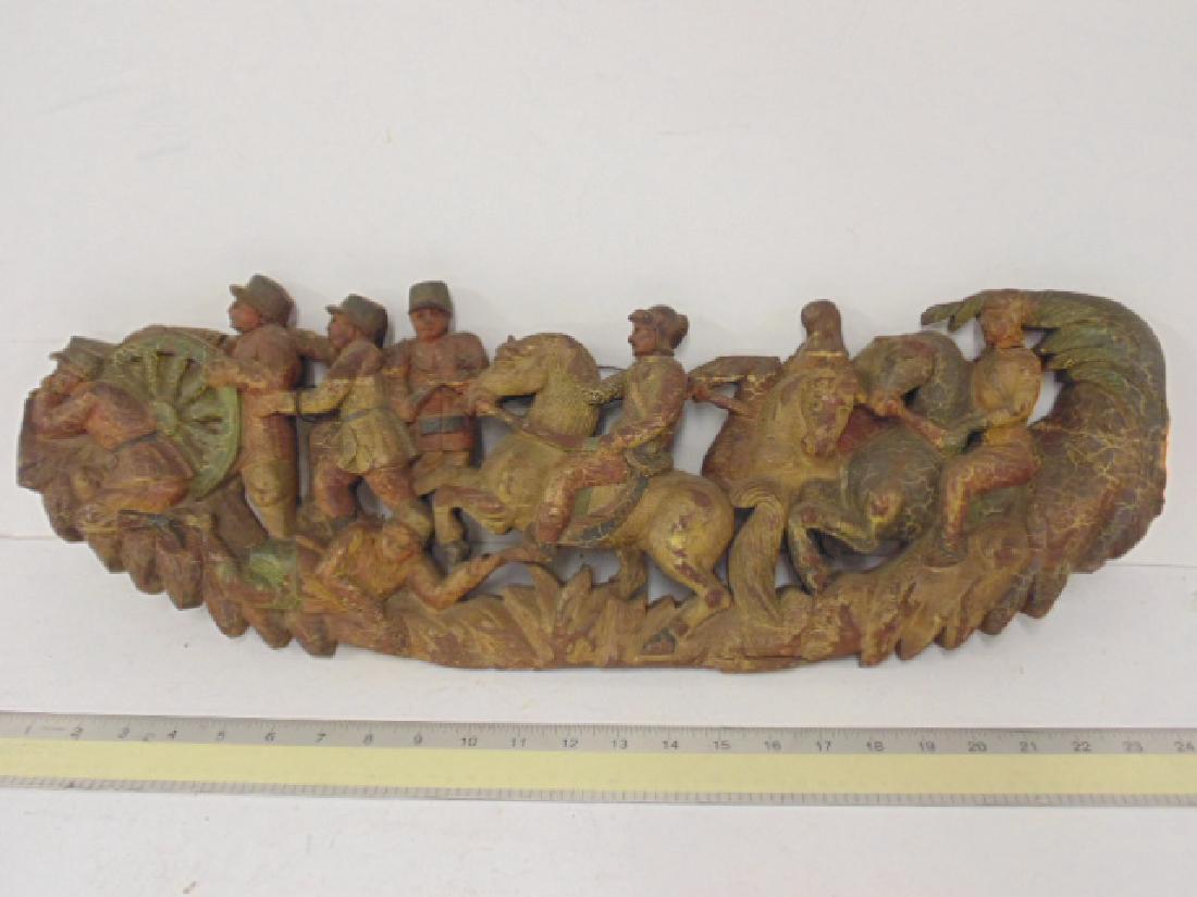 Chinese polychrome wood carving, Boxer rebellion: Asian, Chinese polychrome wood carving, Boxer rebellion scene with various soldier figures, some on horseback manning a gun, 25" long, 8" tall