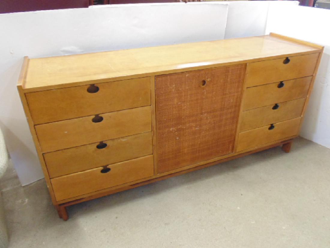 Mid Century Modernage Furniture Corp. credenza: Mid Century Modernage Furniture Corp. credenza with recessed pulls, veneer damage on sides, used condition, old label on reverse, cabinet is 65.25" by 17.75", height is 31.5"