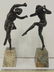 Pair French art deco figural bronzes on onyx bases