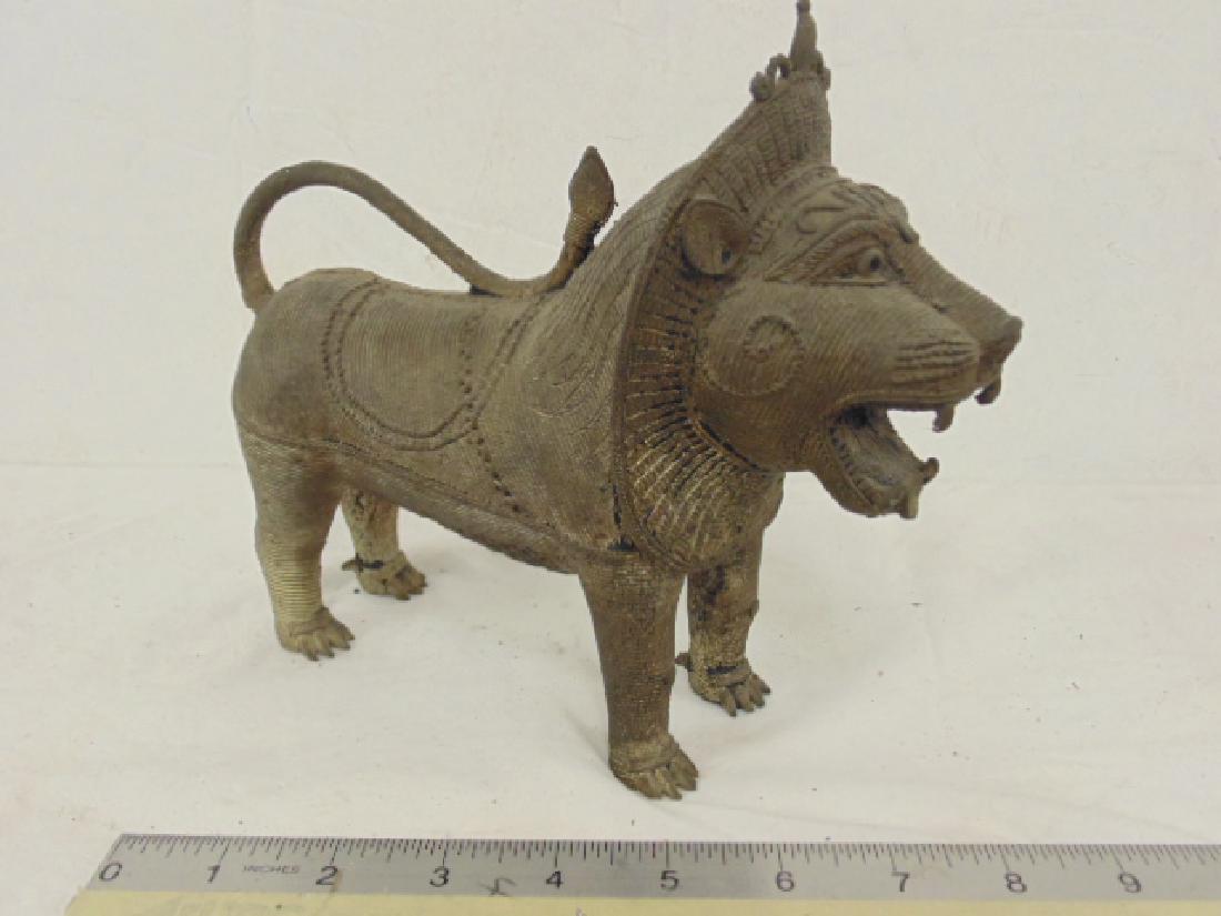 Bronze lion, India, decorated with various designs (1 of 6)