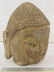 Carved stone head of Buddha