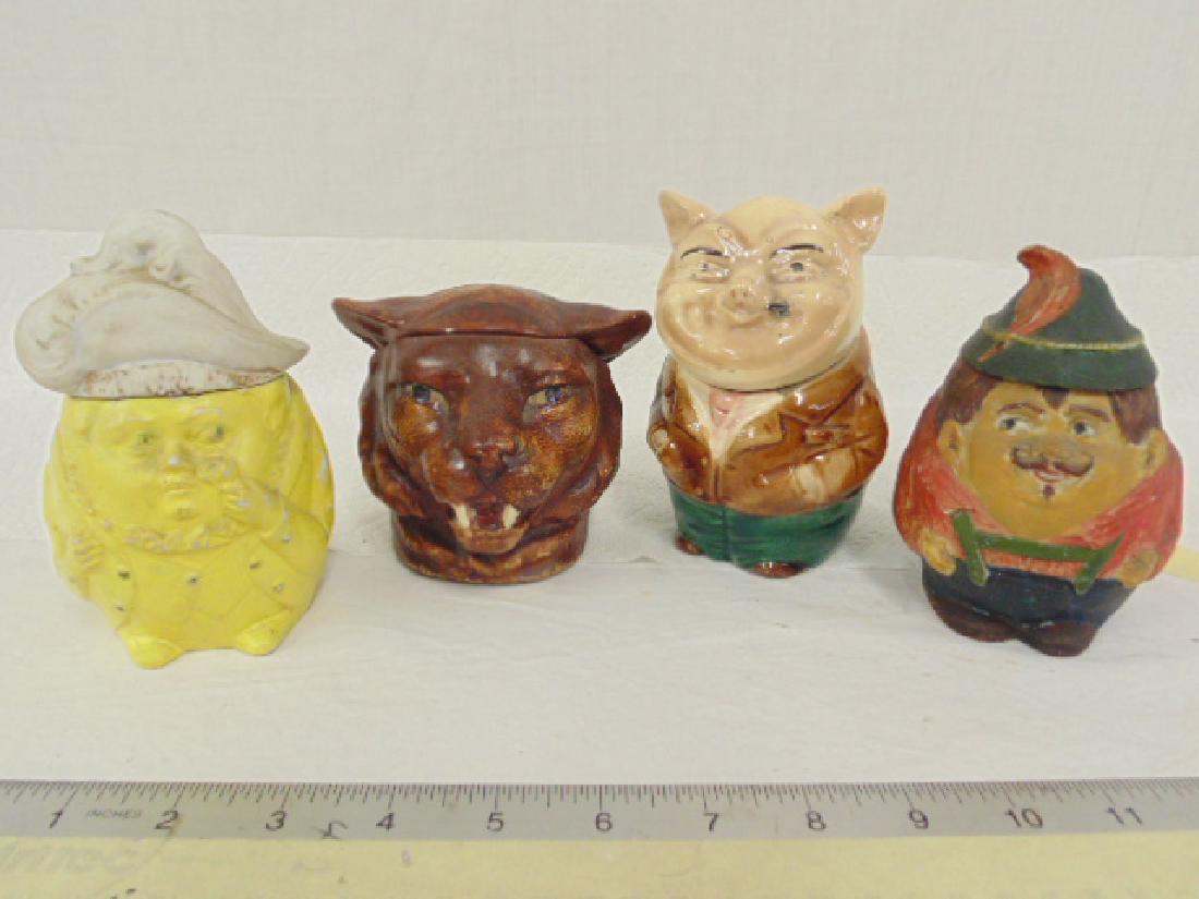 4 tobacco jars, humidors, including rare tiger jar: 4 tobacco jars, humidors, including rare tiger jar, pig with suit & two Humpty Dumpty style humidors, tobacco jars height ranges from 4" to 5.5"