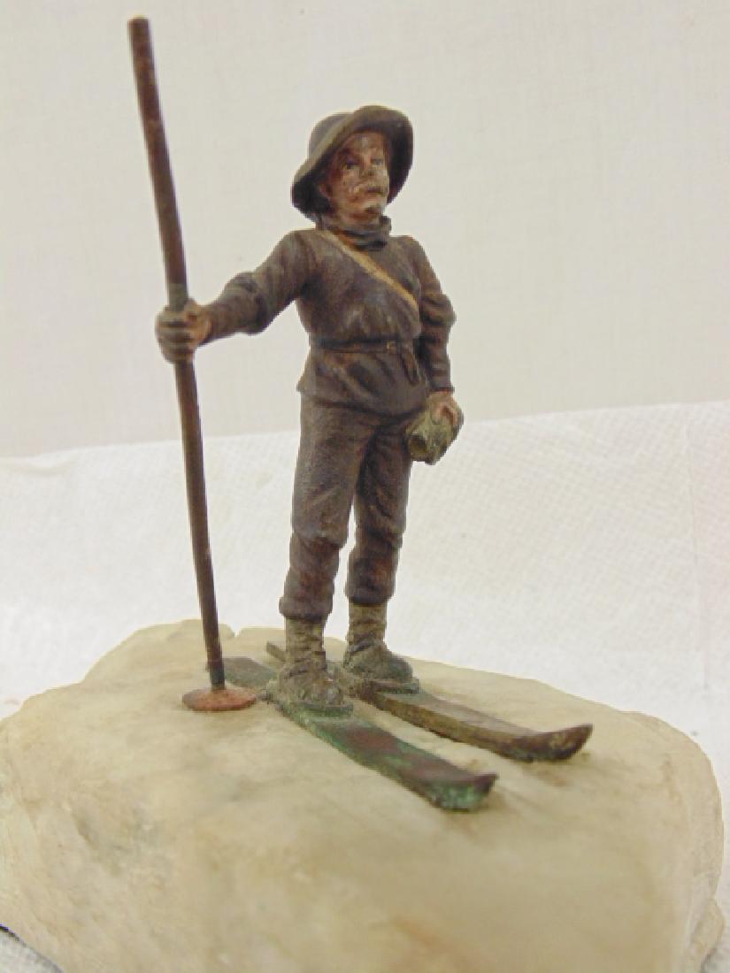 Cold painted bronze figure skier on stone base (1 of 5)