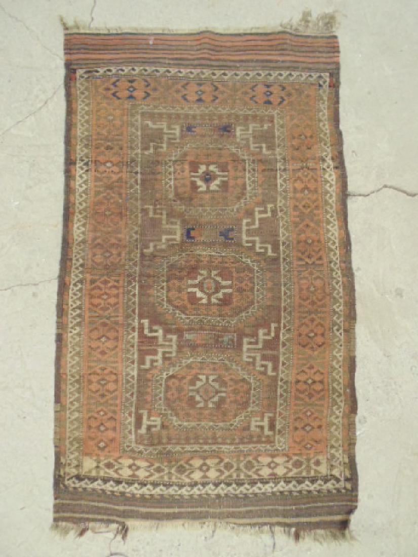 Small brown scatter rug, geometric pattern (1 of 4)