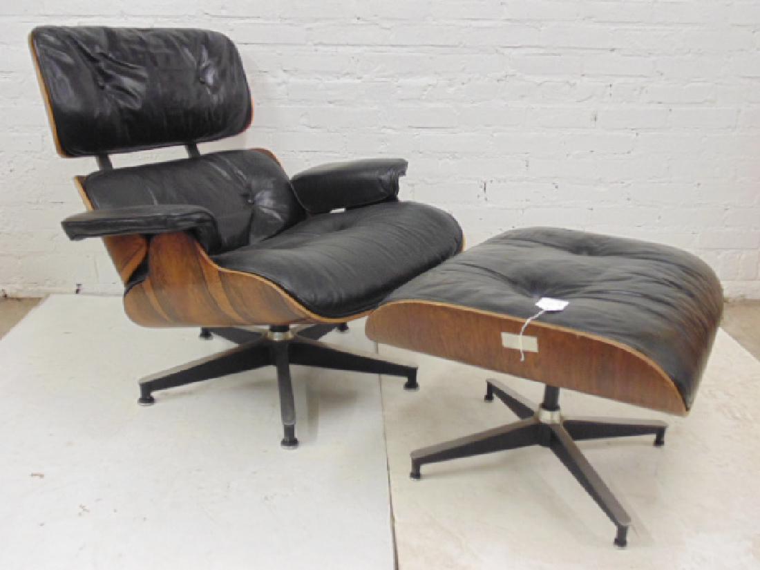 Black leather Eames chair with ottoman, rosewood shell,