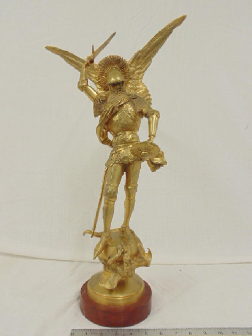 Gilt bronze, Emmanuel Fremiet, "St. Michael and the: Gilt bronze, Emmanuel Fremiet, "St. Michael and the Dragon", Barbedienne Foundry, on red stone base, height is 23.5", missing a small spur on right boot.