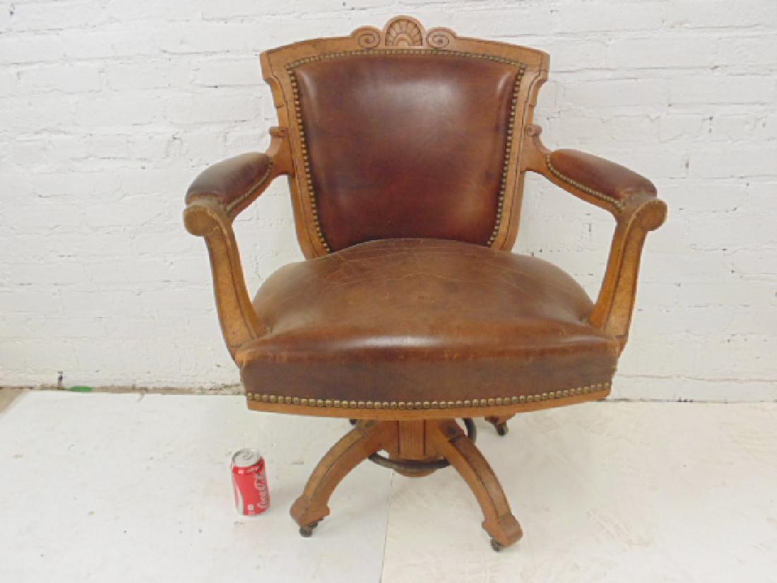 Renaissance revival office chair, light brown leather,: Renaissance revival office chair, light brown leather, swivel base