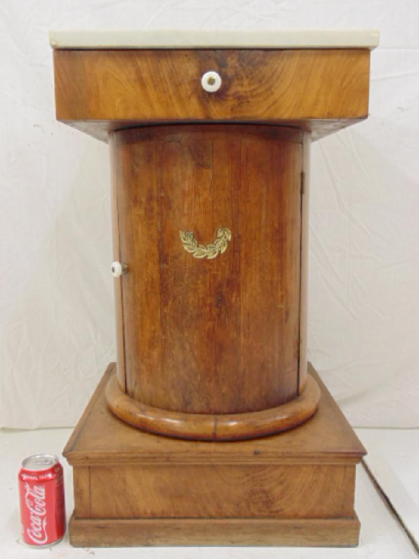 Biedermeier column base single drawer stand with white: Biedermeier column base single drawer stand with white marble top, top is 16.5" by 16.5", height is