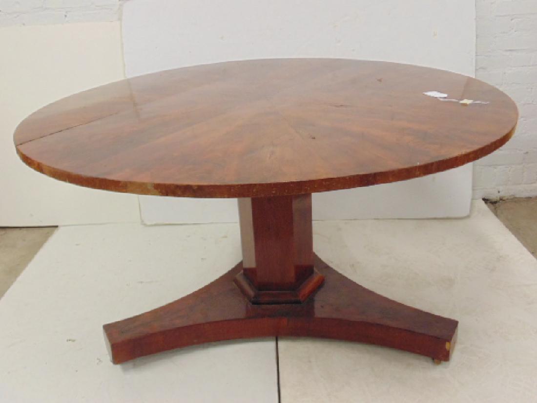 Round Biedermeier dining or center table, top is 54.5",: Round Biedermeier dining or center table, top is 54.5", height is 28.75", some scratches & veneer chips. Matched veneers