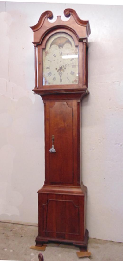 Tall case clock, Dutch sail ship on dial, cherry case,: Tall case clock, Dutch sail ship on dial, cherry case, two iron weights, front panel base is cracked, height clock is 82.5", clock runs.
