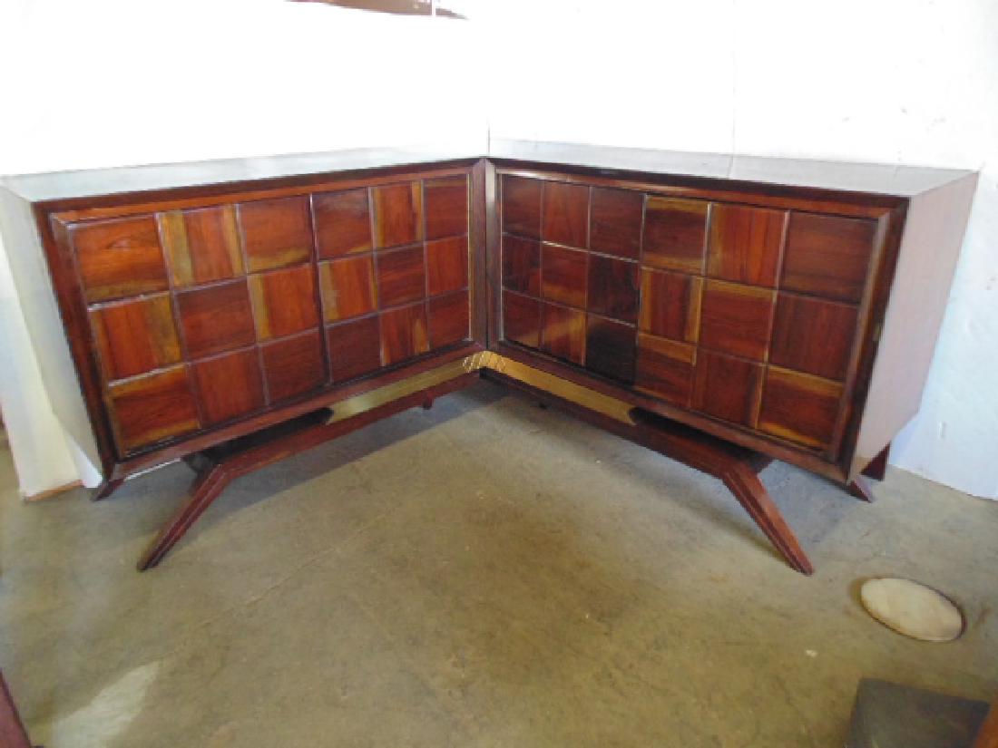 Mid Century corner credenza, in rosewood, 2 doors on: Mid Century corner credenza, in rosewood, 2 doors on each side, cabinet found in storage unit, needs restoration, some chips, scratches, cabinet is 65 x 65, depth 19 1/4" height 35 1/2"