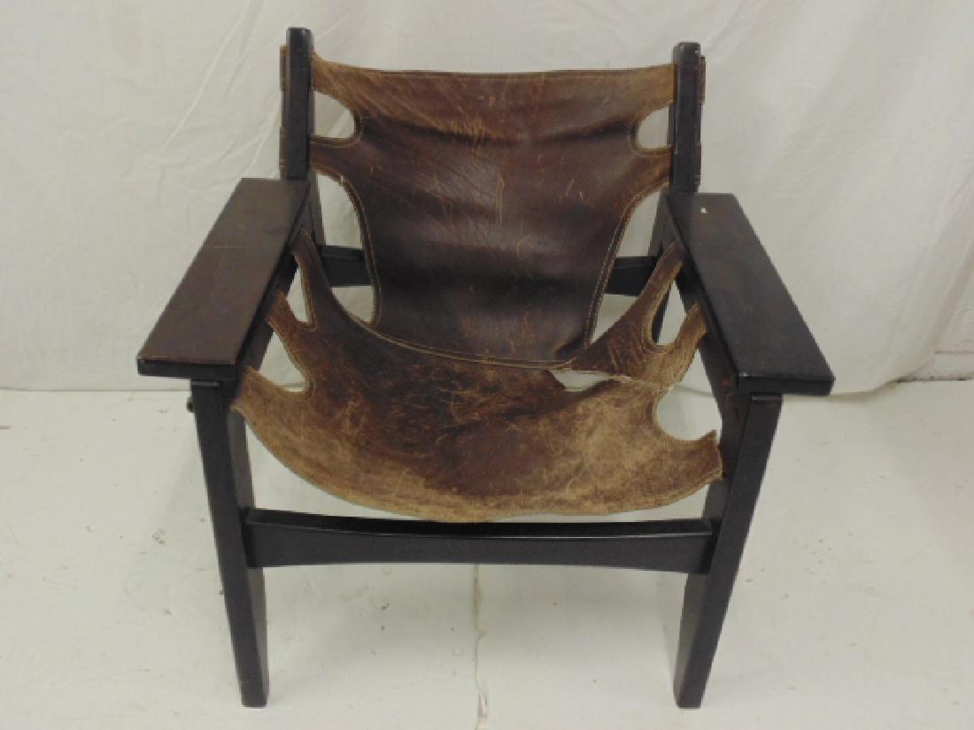 Mid Century Sergio Rodriguez armchair with leather: Mid Century Sergio Rodriguez armchair with leather sling seat,, chair is 26.25" by 23", height is 26.5", leather ripped, needs to be replaced