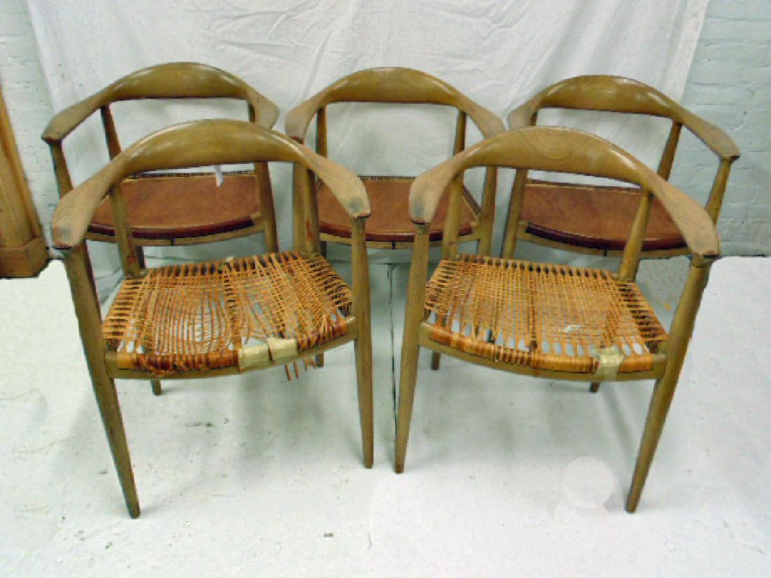 5 Danish Johannes Hansen Chairs, "The Chair", 5 arm: 5 Danish Johannes Hansen Chairs, "The Chair", 5 arm chairs in as found condition, chairs need seats, 3 have replaced plywood seats, 2 have the original covering in as is condition, chairs are signed, 